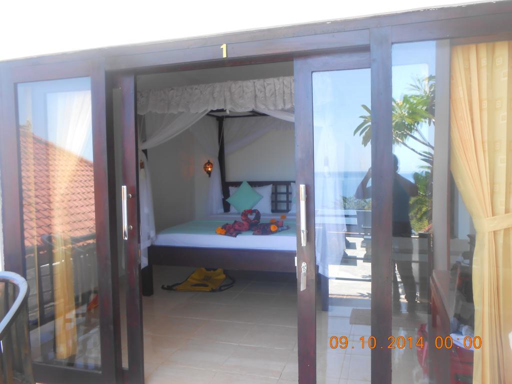Titi Sedana Homestay Амед Экстерьер фото