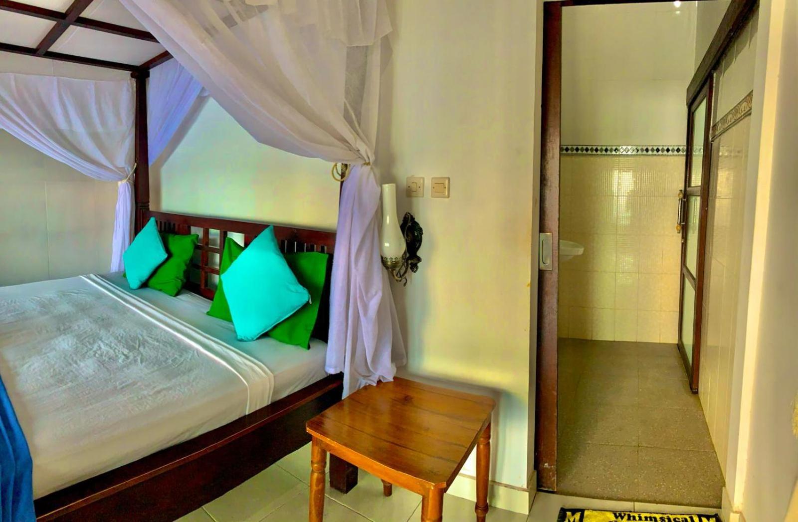 Titi Sedana Homestay Амед Экстерьер фото