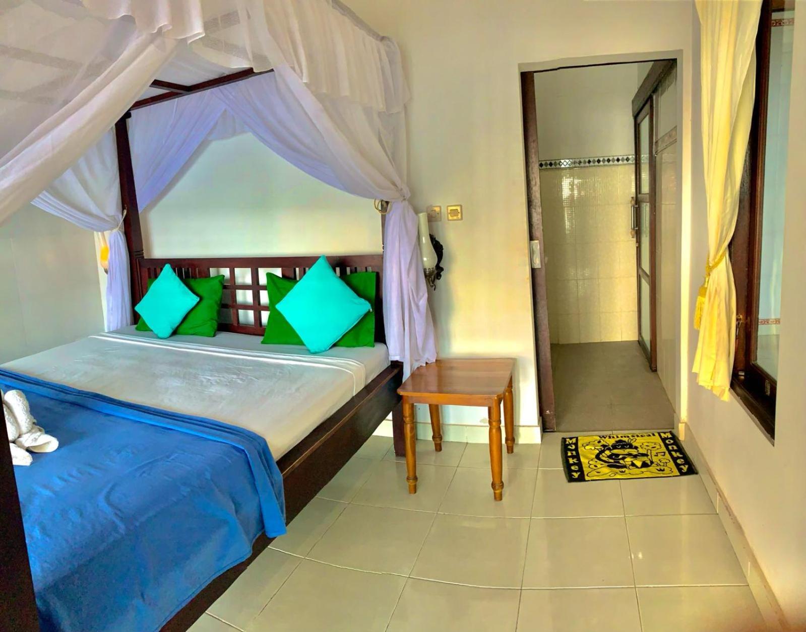 Titi Sedana Homestay Амед Экстерьер фото