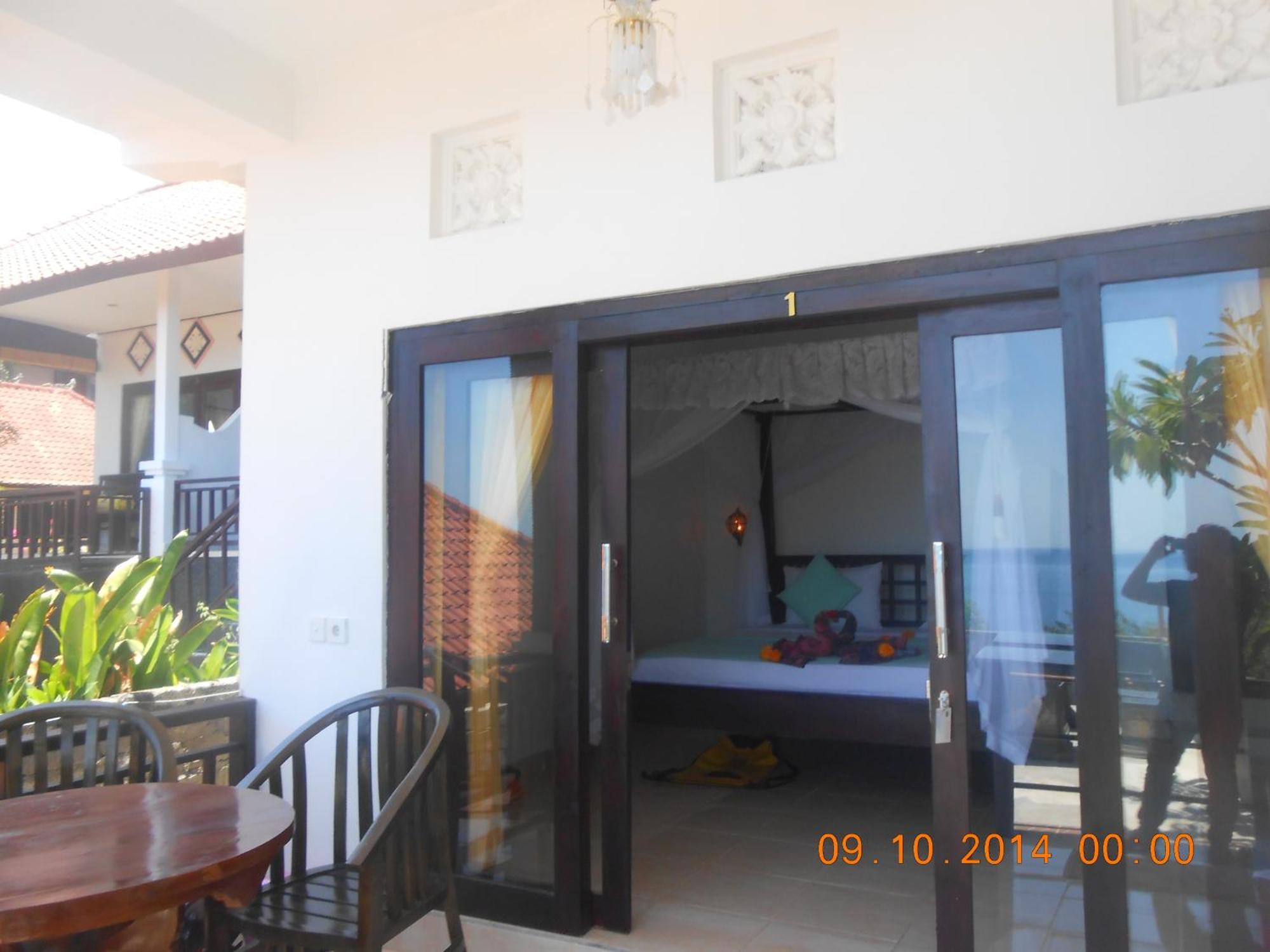 Titi Sedana Homestay Амед Номер фото