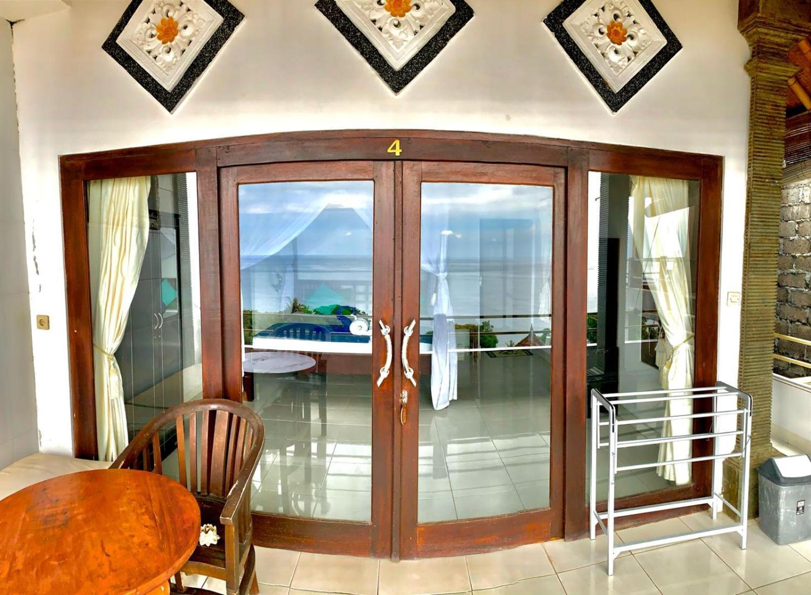 Titi Sedana Homestay Амед Экстерьер фото