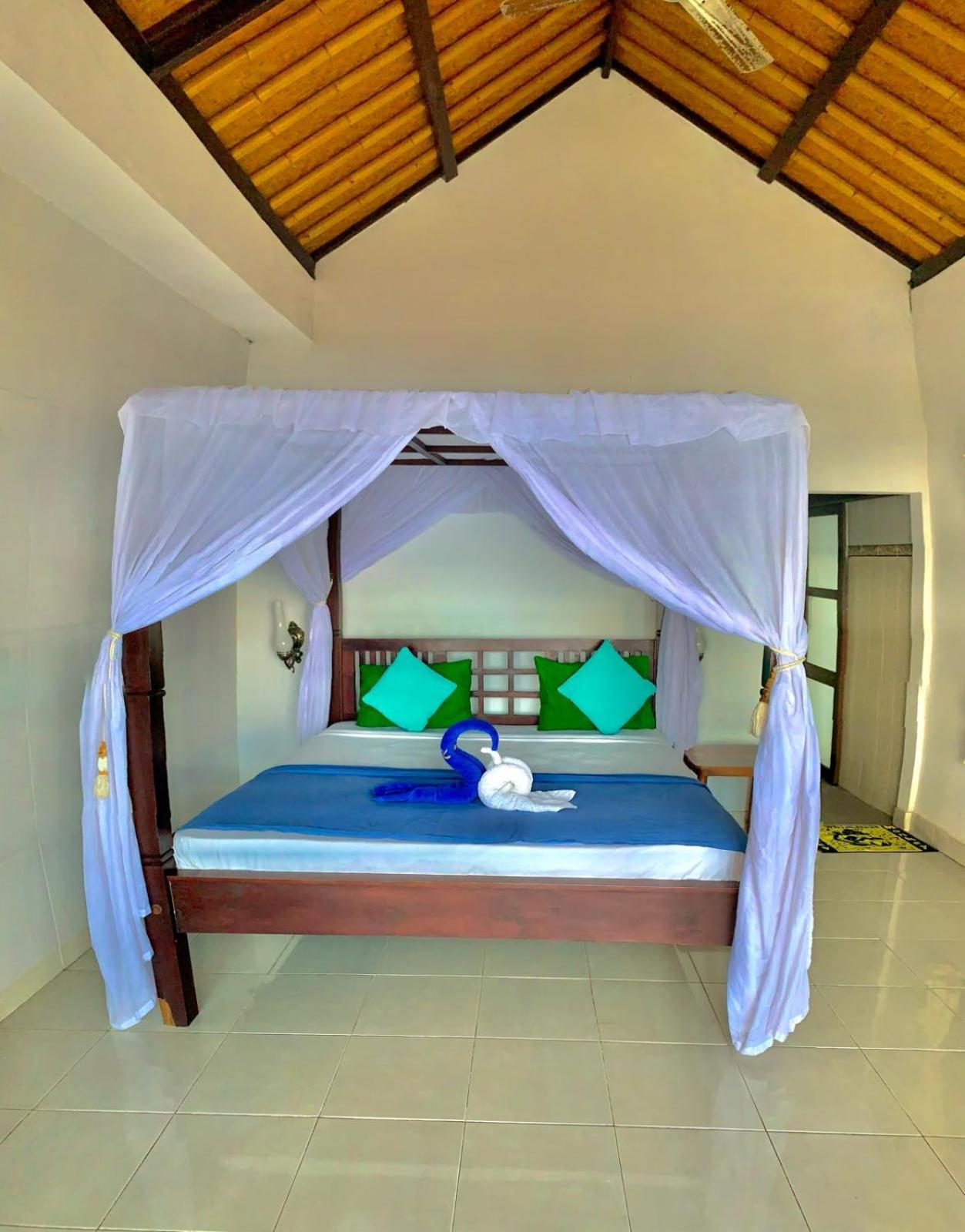 Titi Sedana Homestay Амед Экстерьер фото