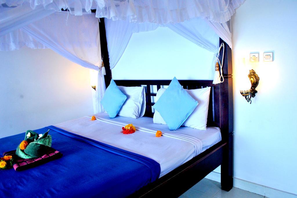 Titi Sedana Homestay Амед Экстерьер фото