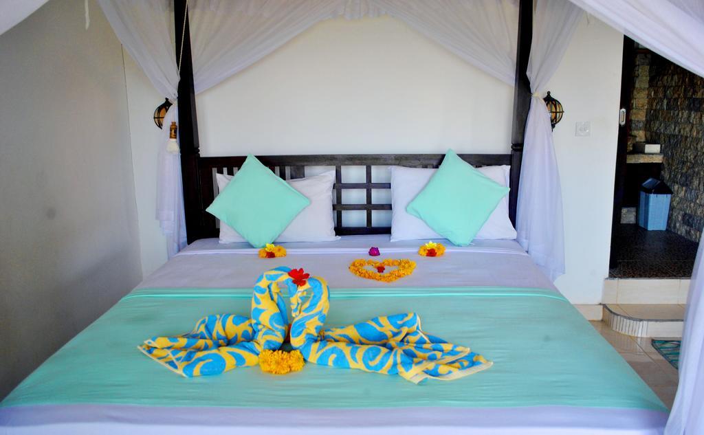 Titi Sedana Homestay Амед Экстерьер фото