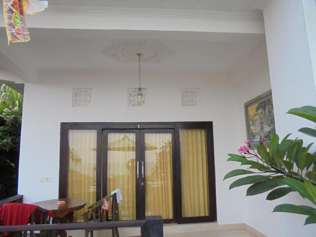 Titi Sedana Homestay Амед Экстерьер фото