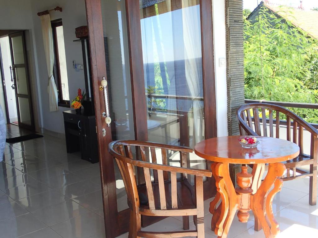 Titi Sedana Homestay Амед Экстерьер фото
