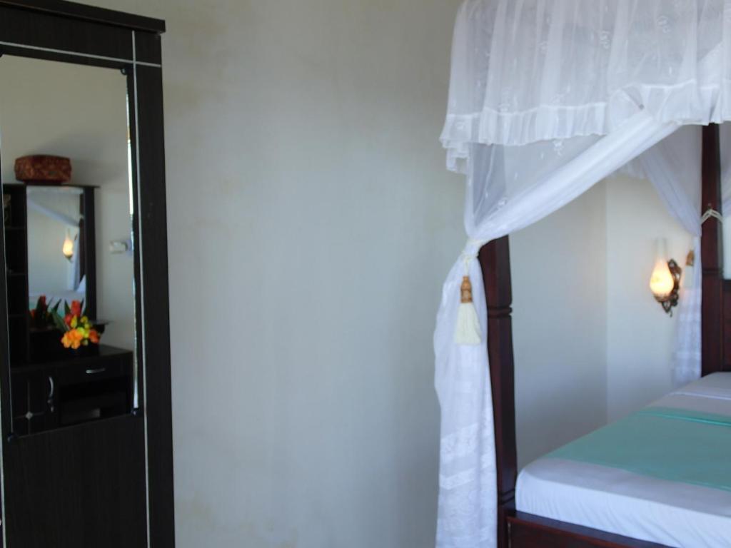 Titi Sedana Homestay Амед Экстерьер фото