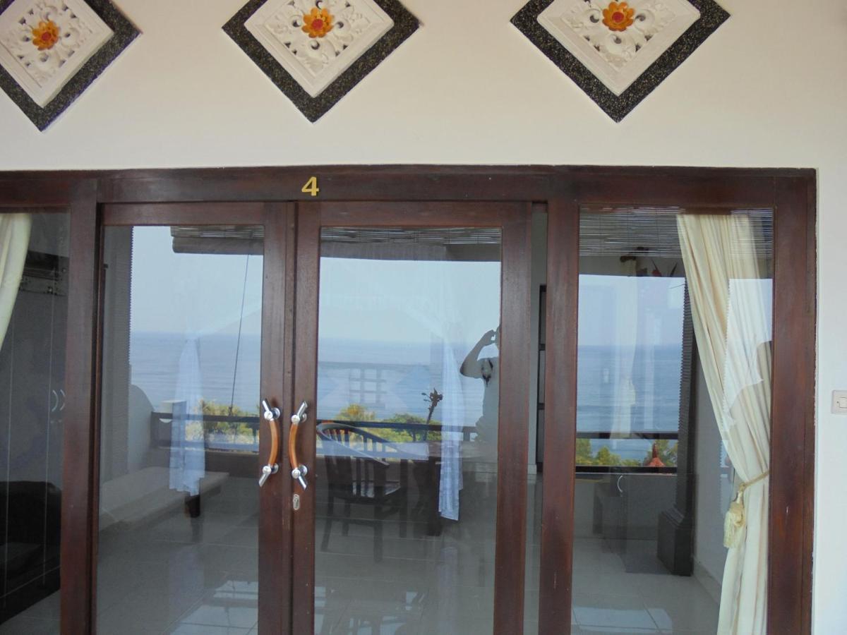 Titi Sedana Homestay Амед Экстерьер фото